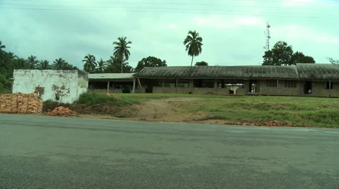 WIDE ON ADEISO SCHOOL VAN DRIVE BY Stock Footage 57983329