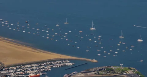 Wide aerial cinematic of small harbor inside small bay of France near Bordeaux Stock Footage 258227953