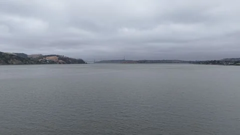 Wide Aerial Down Carquinez Strait Toward Bridge, Overcast, Benicia, 4K Stock Footage 337389846