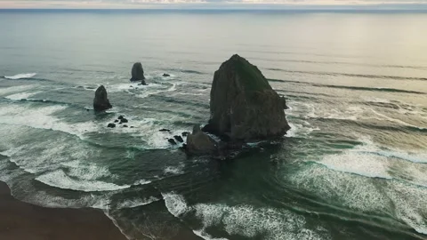 Wide Aerial Drone Footage of Haystack Rock Cannon Beach Oregon Stock Footage 169530125