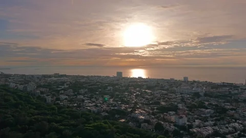 Wide Aerial Drone Pull Back of Santo Domingo Coastline at Sunrise Stock Footage 342050474