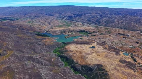 Wide Aerial Drone Pullback Over Manorburn Dam New Zealand Stock-Footage 317240748