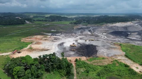 Wide aerial drone view of large open pit coal mine Video stock 329281691