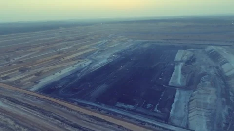 Wide Aerial Flyover of Thar Engro Coal Mining Pit at Dusk Stock Footage 344056134