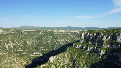 Wide aerial footage showcasing the dramatic limestone cliffs and deep canyon of Stock Footage 346665319