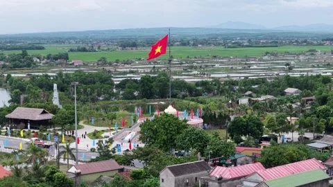 Wide aerial of green rice fields along former DMZ area 4K Stock Footage 339865409