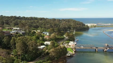 Wide aerial hovering over oyster fish farms in Wagonga inlet Narooma as 4k. Stock Footage 194592769