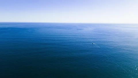 Wide aerial of open Atlantic Ocean with small vessel, Cape Town Stock Footage 339190497