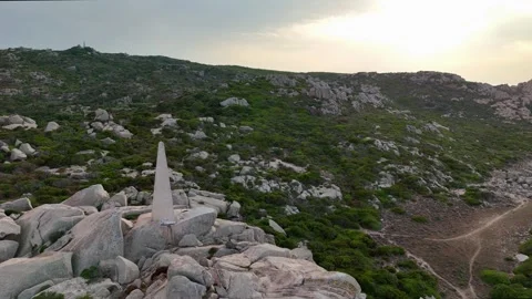 Wide Aerial Orbit of Lighthouse and Horizon Sardegna Mediterranean Sunse Vídeo Stock 333516301