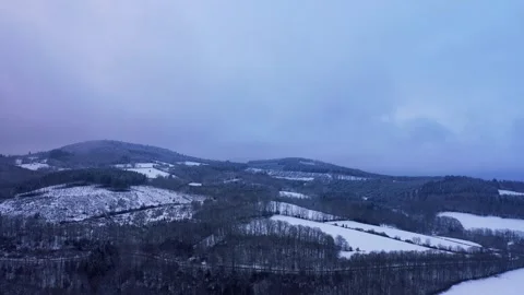 Wide aerial panoramic shot of the Morvan Forest and Haut Folin hills covered in Stock Footage 346665058