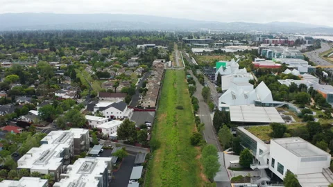 Wide aerial pullback shot of Menlo Park suburb and business offices Stock Footage 308253832