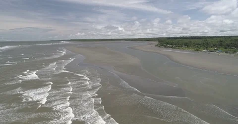 Wide aerial sailing down the Pacific Coast of Colombia over La Barra beach Vídeos de archivo 79285896