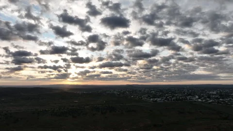 Wide aerial view of Broken Hill and the surrounding outback as the rising sun Video stock 342337786