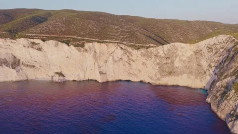 Wide Aerial View of Coastal Cliffs and Deep Blue Bay, Zakynthos, Greece Stock Footage 346889999