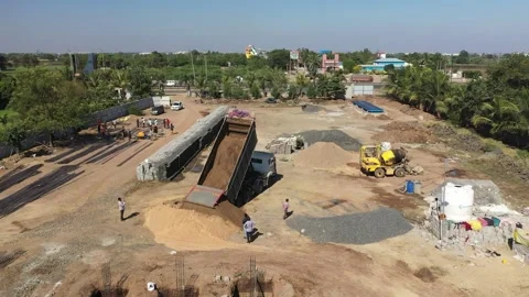 Wide Aerial View of Construction Site with Dump Truck Unloading Materials. Vídeos de archivo 339980764
