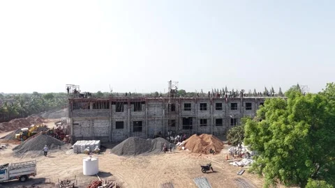 Wide Aerial View of Construction Site Building Project with Laborers and Stock Footage 340930013