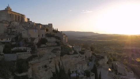Wide aerial view looking up at structures in Gordes, France Stock Footage 102522321