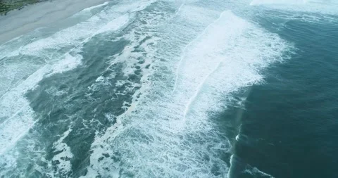 Wide aerial view of ocean waves and beach The Concept of Vastness 스톡 동영상 323373715