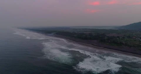 Wide Aerial View of Ocean Waves and Coastal Landscape 스톡 동영상 332144877
