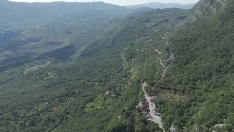 Wide Aerial View of Ostrog Monastery Region in Montenegro – Spring Landscape Stock-Footage 310335537