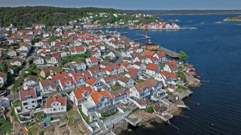 Wide aerial view of Risor Norway with classic white houses on rocky coastline. Stock Footage 328124929