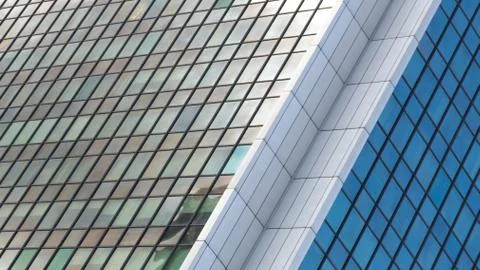 Wide angle abstract background view of steel light blue high rise commercial Stock Photos