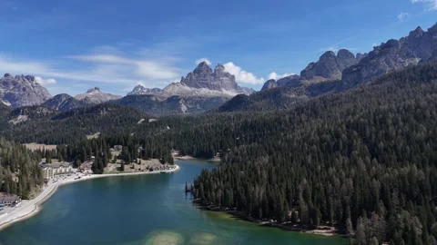 Wide Angle Aerial Overview of Misurina Lake Basin and Distant Alpine Pea Stock Footage 341304656