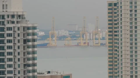 Wide Angle and High-Angle Shot of Penang Port In Between High-Rise Buildings Stock Footage 48141504