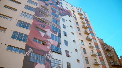 Wide Angle of Apt Mural, Little Girl, Womans March 2019, Los Angeles Video stock 101481021