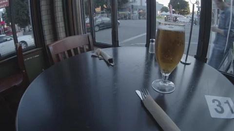 Wide Angle of Beer, patiently waiting on food at restaurant Video stock 101436745