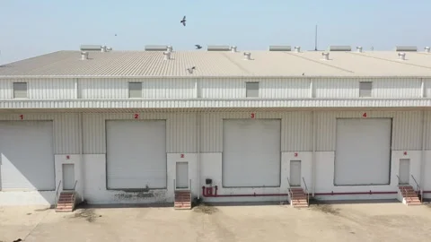 Wide angle big logic tricks warehouse drone camera showing 動画素材 259557557