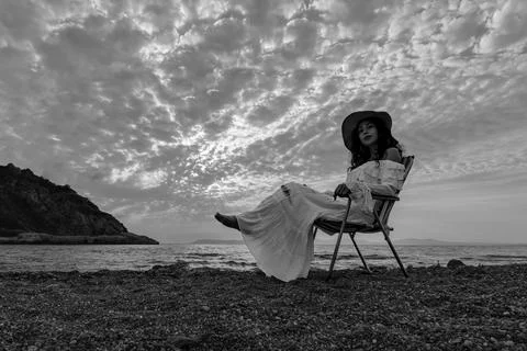 Wide Angle Black and White View of Woman on Beach in Seferihisar Stock Photos