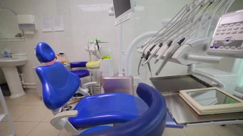 Wide angle bottom view panorama of dentist's office, dentist blue color chair Stock Footage 142121978