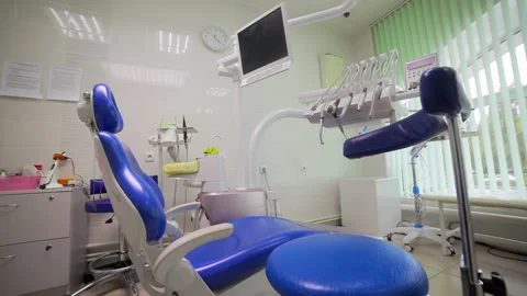 Wide angle bottom view panorama of dentist's office, dentist blue color chair Stock-Footage 142121992