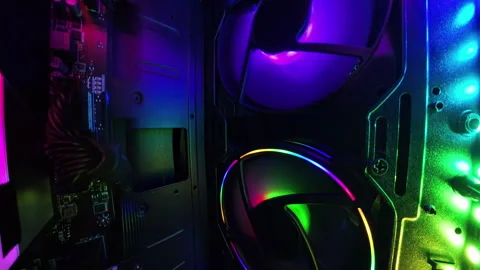 A wide-angle camera captures close-up views of the interior of a gaming PC, Stock Footage 289787060