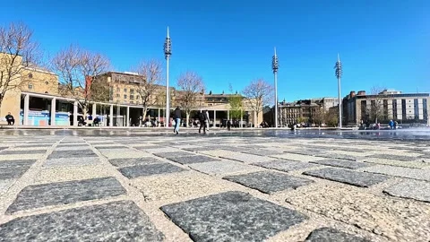 Wide-angle cinematic low-angle view of City Park plaza in Bradford Stock Footage 334995601
