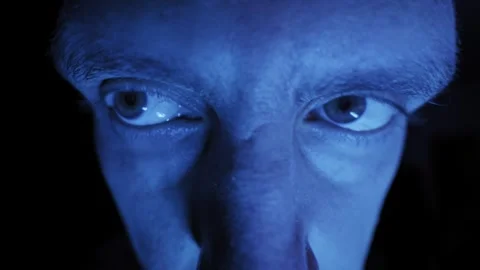 Wide Angle Close Up Paranoid Man Eyes Looking Around Blue Light Stock-Footage 326313191