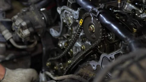 A wide-angle close-up reveals the complex assembly of a car engine with an ex Stock Footage 345108117