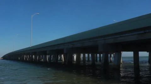 Wide angle concrete bridge over water Video stock 36044186