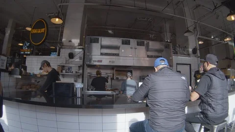 Wide Angle of Cooks Making Eggs at Market Dinner Video stock 101441335