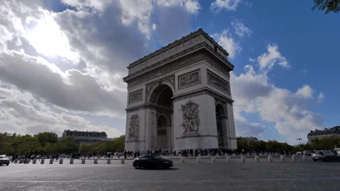 Wide-angle daylight view of the Arc de Triomphe in Paris Stock Footage 329090911