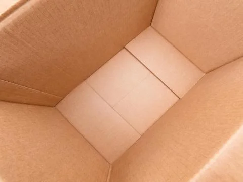 Wide angle diagonal view inside cardboard box Stock-Fotos