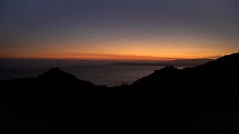 Wide angle dramatic sunset over the Pacific Ocean, Marin County, California 스톡 동영상 97135830