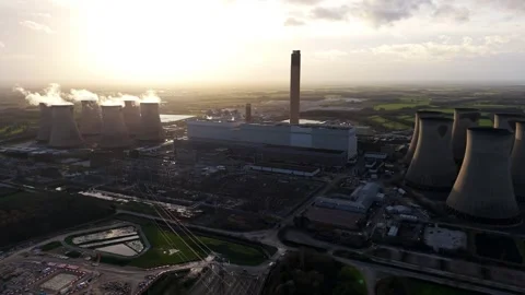 Wide-angle drone perspective of a massive thermal power station and cooling Stock Footage 339047351