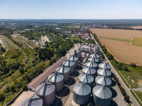 Wide angle elevated perspective of large agroindustrial storage facility feat Stock Photos