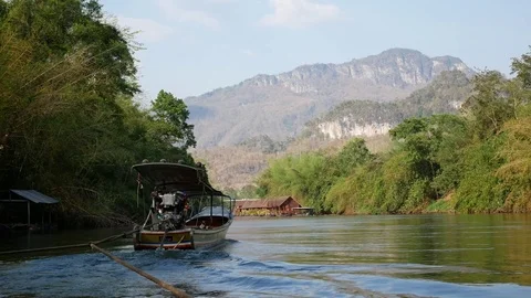 Wide angle footage of boating and rafting trip along River Kwai Stock Footage 74019025