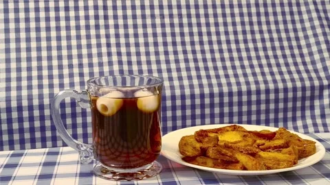 Wide angle front view coke served in a glass cup with ice, straw liquor, an.. Video stock 318127660