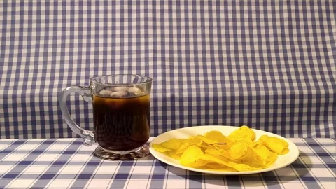 Wide angle front view coke served in a glass cup with ice, straw liquor, an.. Video stock 318127815