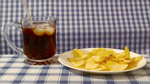 Wide angle front view straw in cola glass cup drink with ice, straw liquor,.. Video stock 318127641