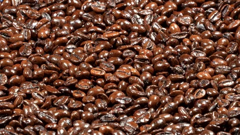 Wide Angle Hard Light Rotating Roasted Coffee Beans 스톡 동영상 331937628